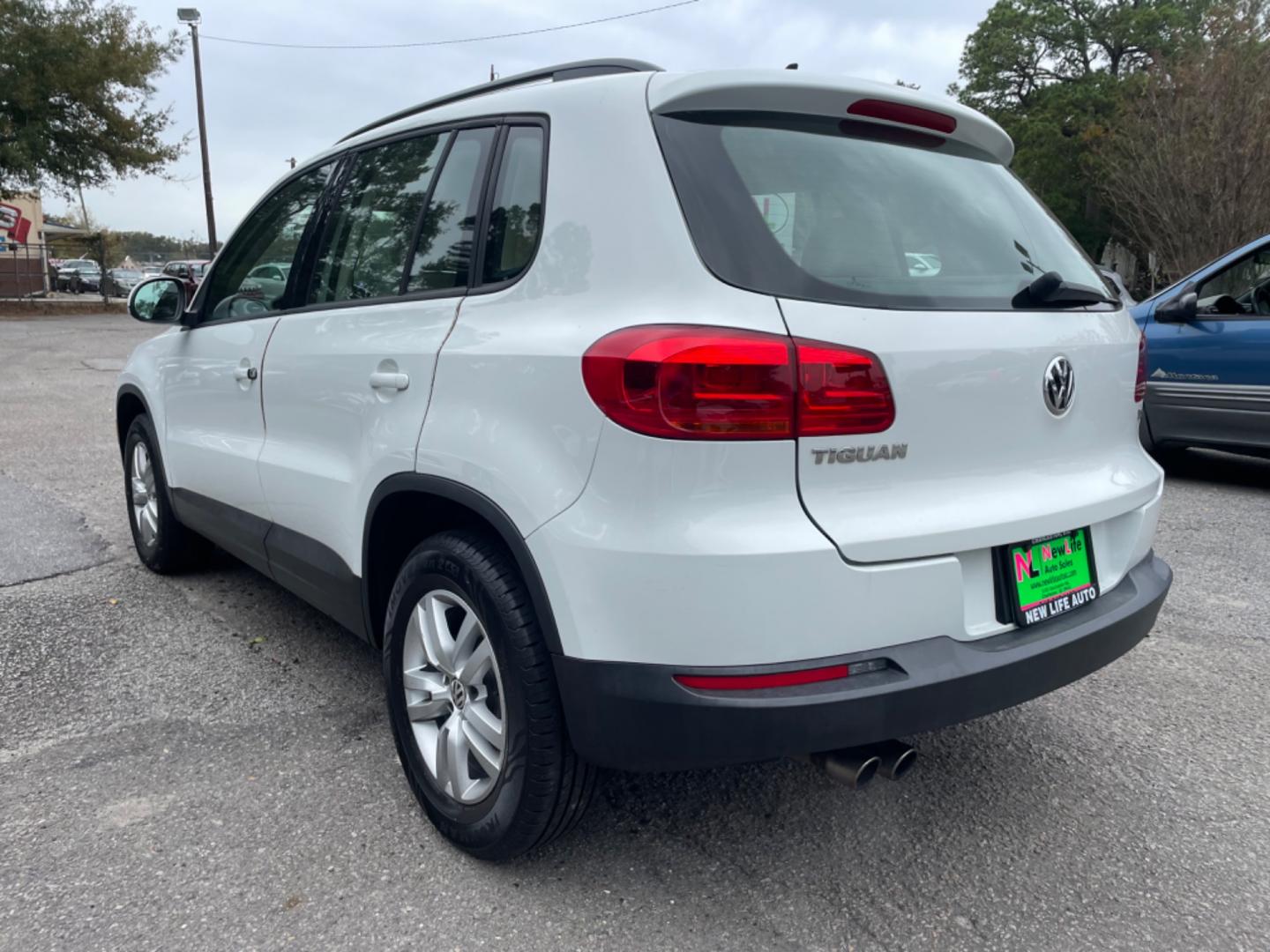 2017 WHITE VOLKSWAGEN TIGUAN S (WVGAV7AX7HK) with an 2.0L engine, Automatic transmission, located at 5103 Dorchester Rd., Charleston, SC, 29418-5607, (843) 767-1122, 36.245171, -115.228050 - Clean Interior with Leather, CD/AUX/USB/Bluetooth, Power Everything (windows, locks, seat, mirrors), Heated Seats, All-weather Mats, Push Button Start, Keyless Entry, Alloy Wheels. Clean CarFax (no accidents reported!) Local Trade-in!! 99k miles Located at New Life Auto Sales! 2023 WINNER for Pos - Photo#4